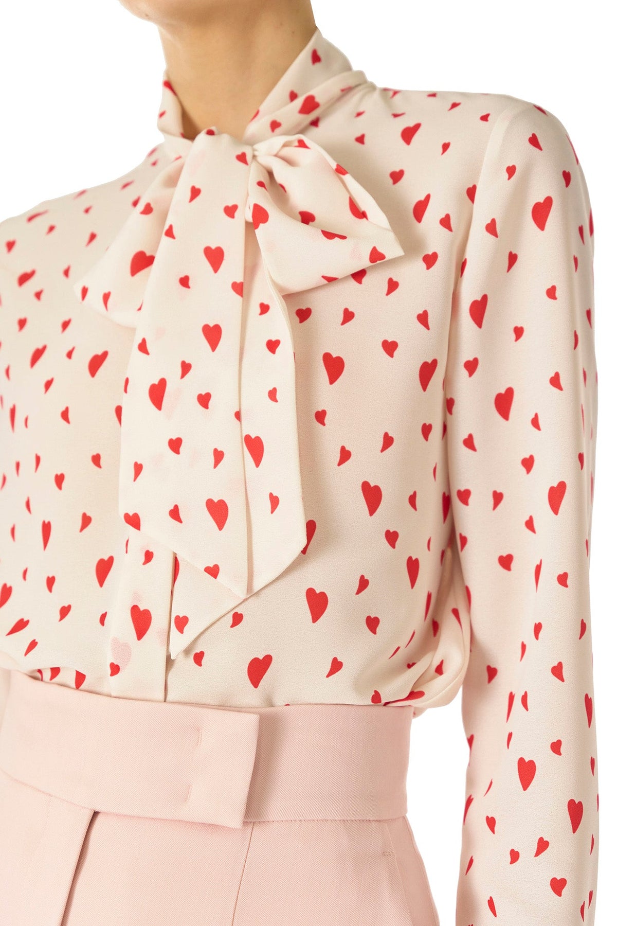 Monique Lhuillier Fall 2024 long sleeve, bow tie blouse in Heart Printed Georgette - detail.