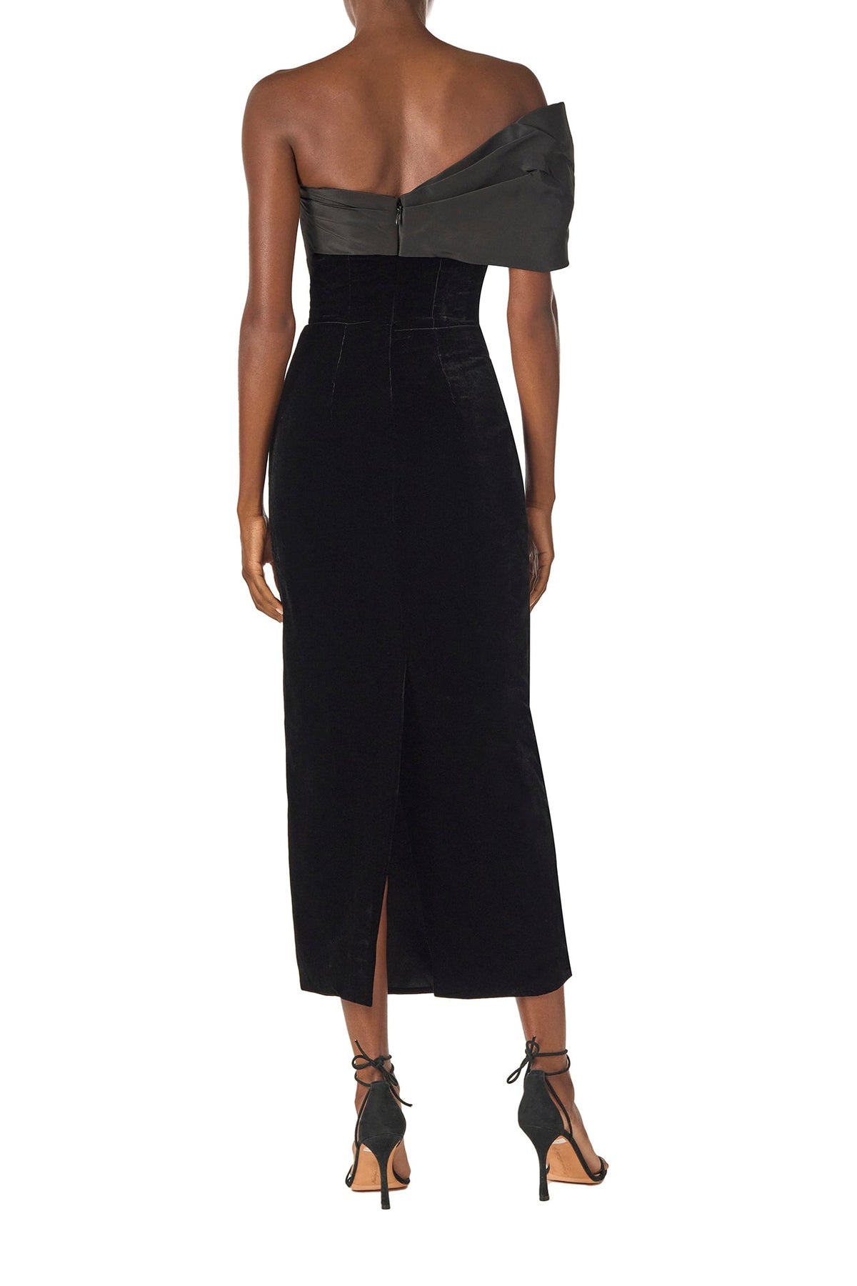 Monique Lhuillier Fall 2024 asymmetric, off the shoulder sheath dress in noir silk faille and velvet with draped twist detail at neckline - back.